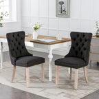 Sedia da pranzo di lusso imbottita in legno massello in lino contemporaneo con gambe in legno e borchie, set da 2 pezzi