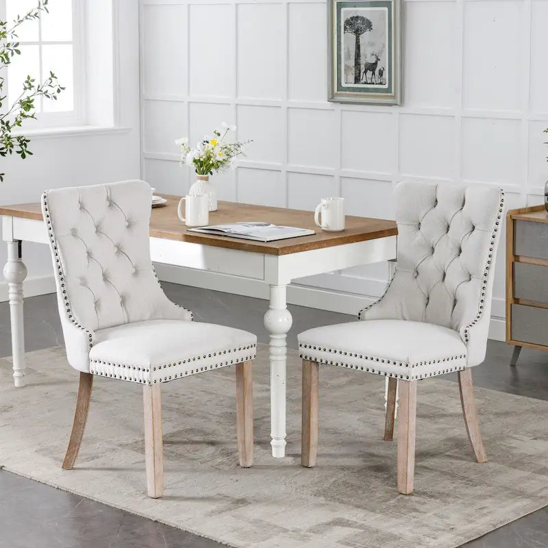 Sedia da pranzo di lusso imbottita in legno massello in lino contemporaneo con gambe in legno e borchie, set da 2 pezzi