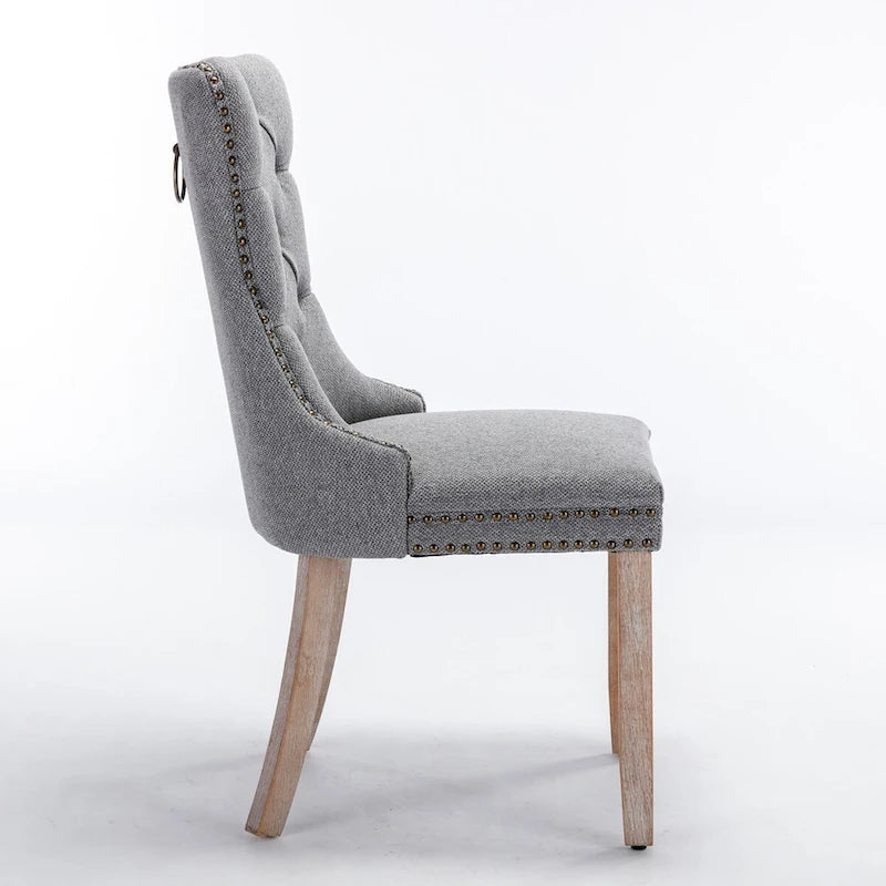 Sedia da pranzo di lusso imbottita in legno massello in lino contemporaneo con gambe in legno e borchie, set da 2 pezzi