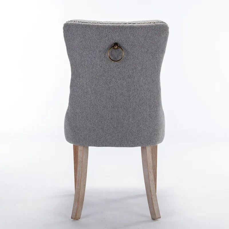 Sedia da pranzo di lusso imbottita in legno massello in lino contemporaneo con gambe in legno e borchie, set da 2 pezzi