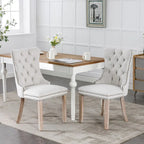 Sedia da pranzo di lusso imbottita in legno massello in lino contemporaneo con gambe in legno e borchie, set da 2 pezzi
