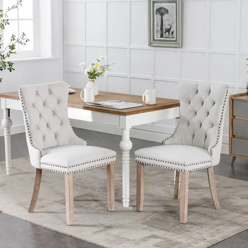 Sedia da pranzo di lusso imbottita in legno massello in lino contemporaneo con gambe in legno e borchie, set da 2 pezzi