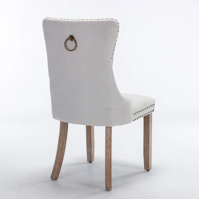 Sedia da pranzo di lusso imbottita in legno massello in lino contemporaneo con gambe in legno e borchie, set da 2 pezzi