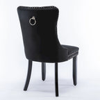 Set da 2 sedie da pranzo contemporanee di lusso con schienale capitonné, struttura in legno massello, rivestimento in velluto e gambe in legno con borchie decorative, colore Oro